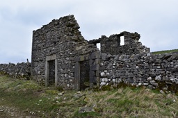 Photo of a stone building probably an old barn that is on the track on the way up to Pen-y-ghent fell, Yorkshire Dales. UK